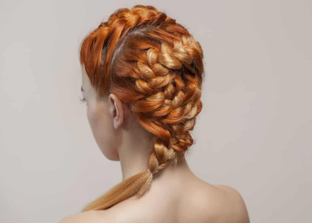 Asymmetrical French braids will give you a modern, edgy look that will have everyone turning their heads! 