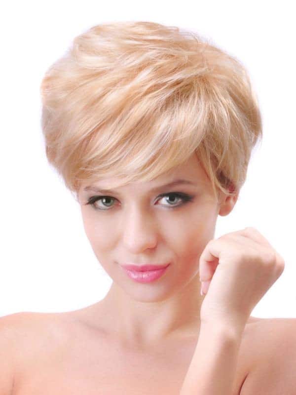 This particular pixie hairstyle has not cut down on the thickness of the hair, only its length. If you want to get that 1960s actress look, with a full crown of hair, only shorter, this is the haircut for you