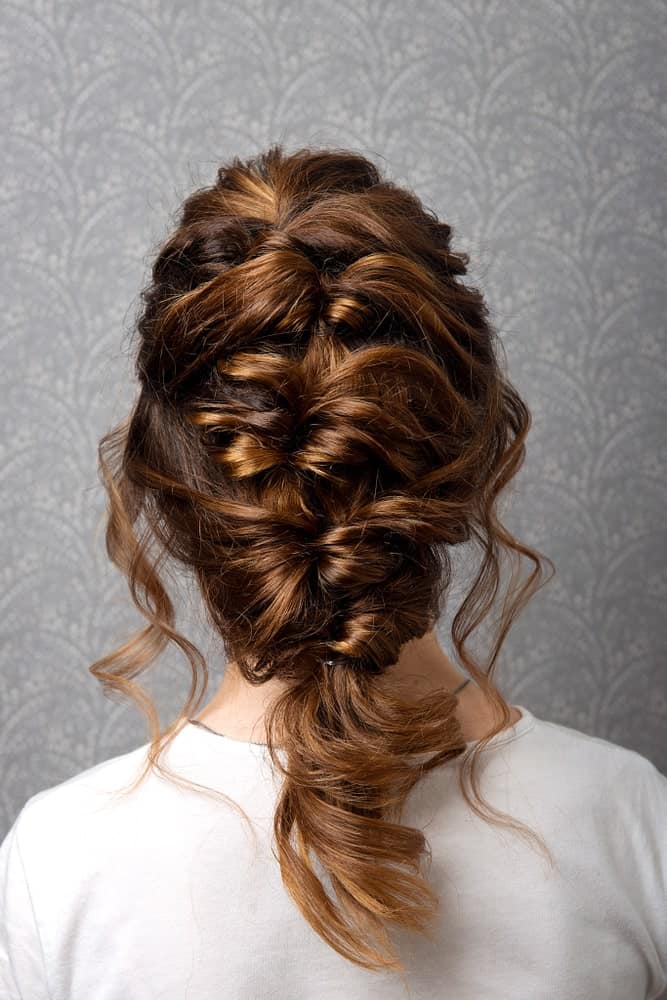 While a Greek braid may look too casual for prom, trust us when we say that you’re going to look absolutely unforgettable. The braid adds volume and character while still being timeless. 