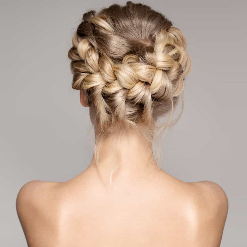 If you want something more polished for prom, why not go for this beautiful braided updo? It’s neat, elegant, and a perfect complement to any dress. 