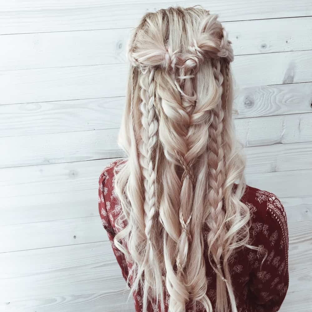 Who doesn’t love the elaborate hairstyle of Daenerys Targaryen in “Game of Thrones?” This hairstyle comprises of a multitude of thin and thick braids and gets you locks like the Khaleesi.