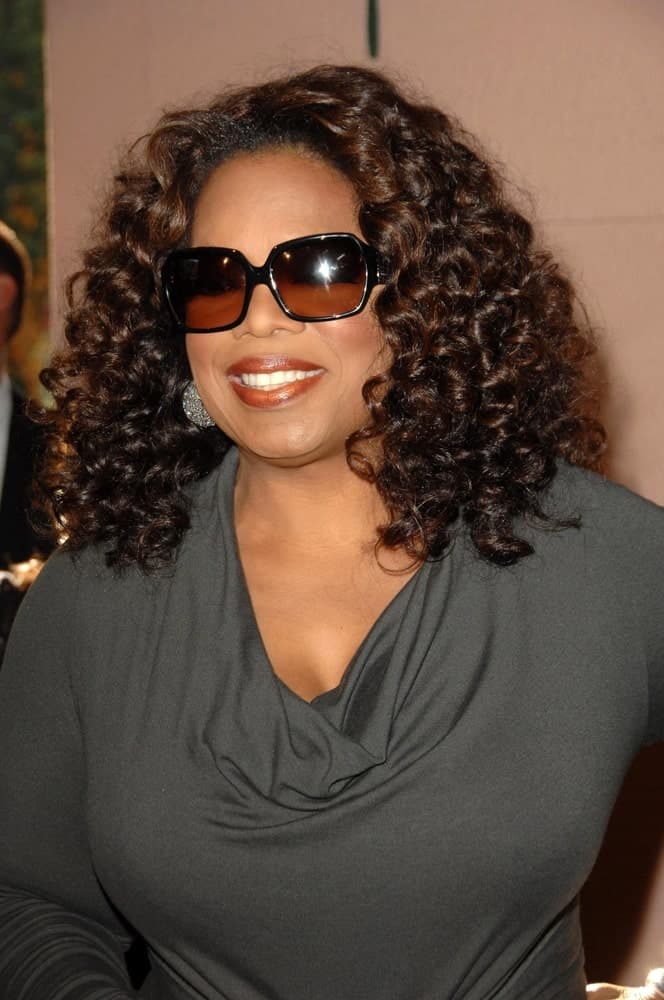 Large-frame glasses look absolutely stunning with curly hair. The tighter your curls and the crazier your hair, the better your large glasses will go along. In fact, one can say it is a match made in heaven! If Oprah Winfrey thinks that, no one shall deny it! 