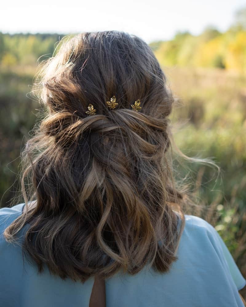 An easy hairstyle for any length of hair is a simple half twist. You can accessorize it for a fancier finish or leave it as it is for a nice, soft look. 