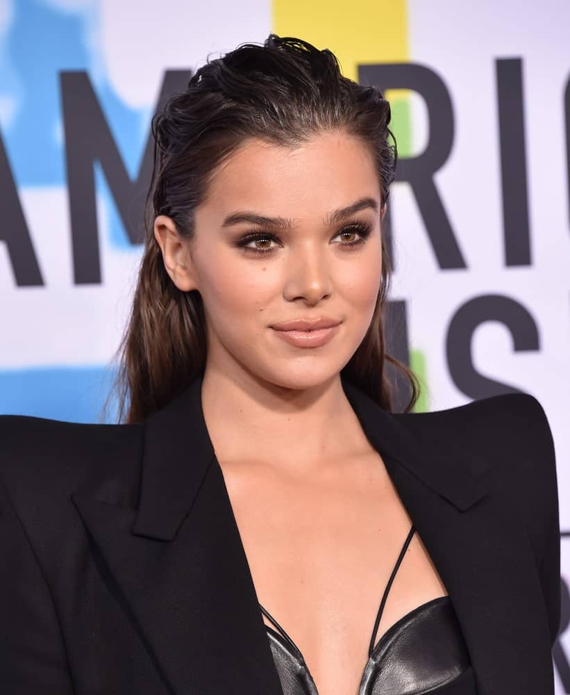 For a rocky, edgy look, go with wet gelled locks like Hailee does here. She’s got some of her hair brushed back and pinned at the crown and the effect is sleek while still being extremely sexy. 