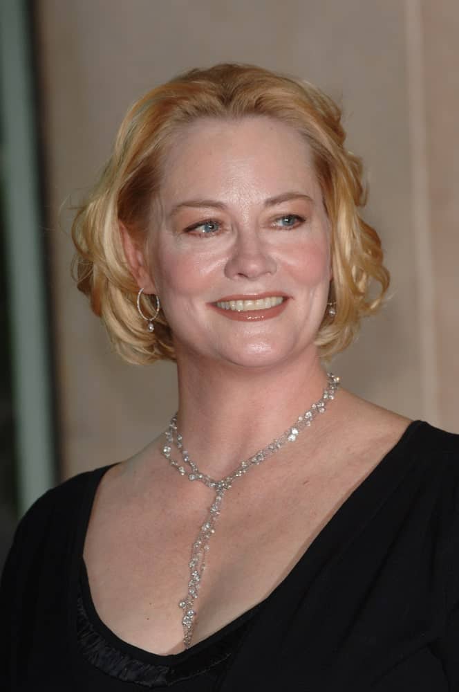 This tousled chin-length layered bob is all you need to rock this look, just like Cybill Shepherd. Notice how the layers of varying lengths and the combo of curls and curves work together to create the perfect lady-like look. 