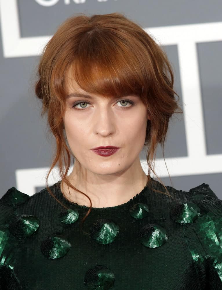 For a more dramatic effect, style your bangs wider like Florence does here. It gives the illusion of thicker hair and we love the finished look!