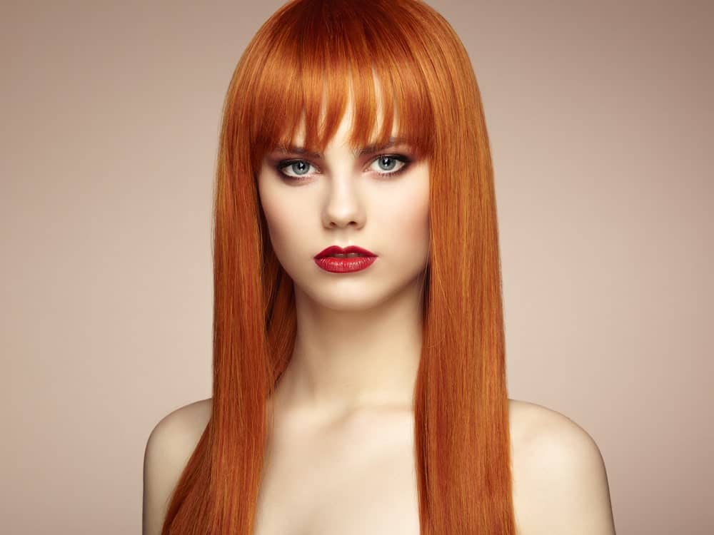 This look is great for those who have super-straight long hair but adventurous people can try it with their short hair as well. The eyebrow-touching bangs are cut in straight jags and then separated. The straight cut brings out more focus to the eyes and cheekbones.