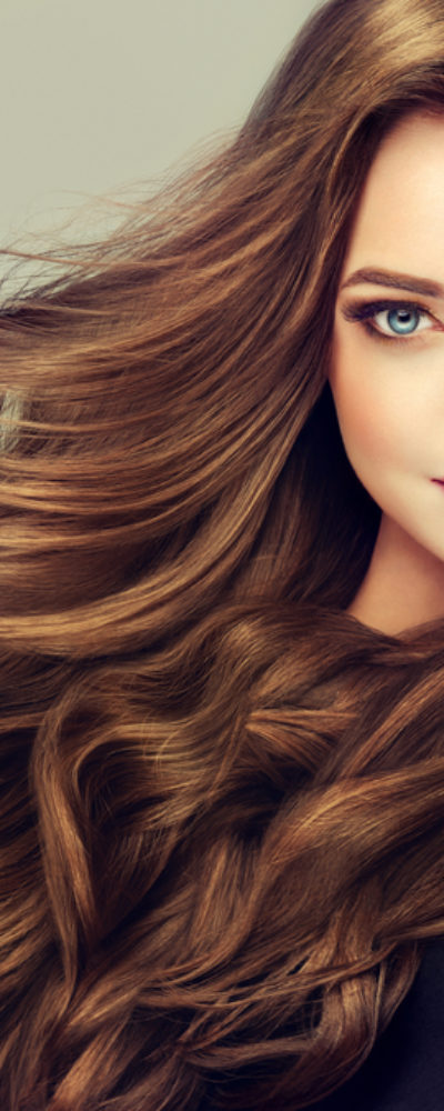 Woman with beautiful wavy brunette hair