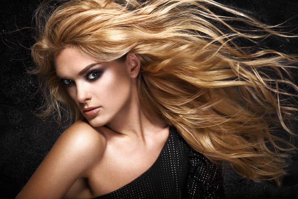 A model with long, blond tousled hair