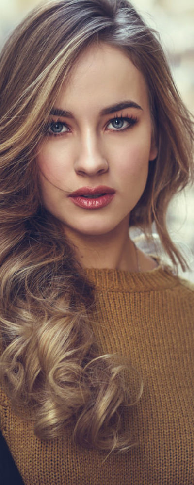 Young woman with wavy hair
