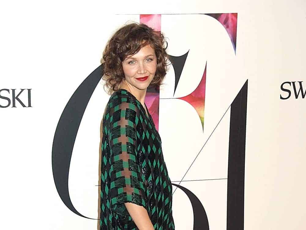 Maggie Gyllenhaal wore a Proenza Schouler dress at The 2008 CFDA Fashion Awards at The New York Public Library, New York on June 02, 2008. She paired this with a chin-length tousled brown curly hairstyle with side-swept bangs.