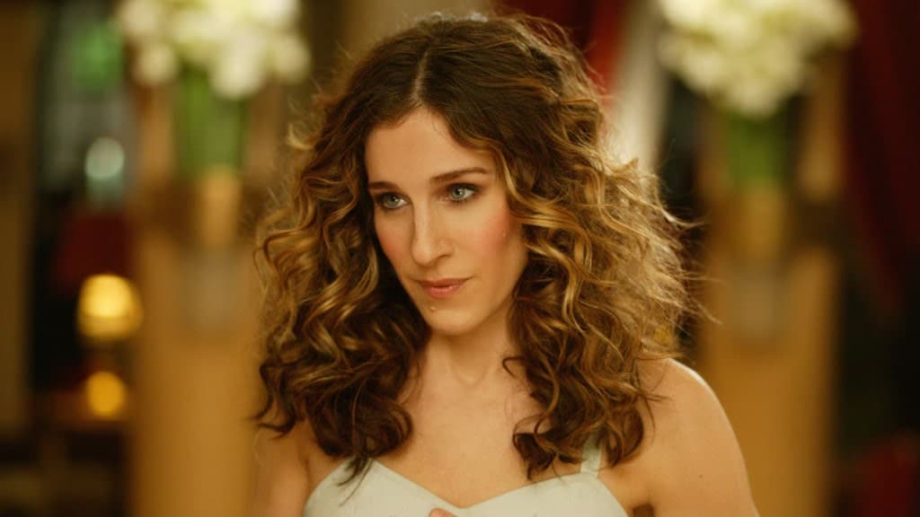 Sarah Jessica Parker iconized the Carrie Bradshaw hairstyle in the comedy series “Sex and the City.” The actress styled her dark gold layers into riotous curls that brought the perm back to the masses. The style is airy, effortless and can be worn at all sorts of events 