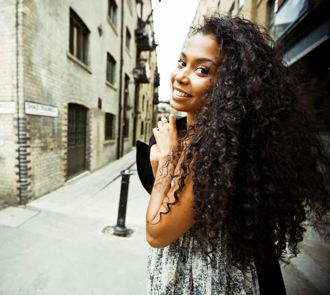 Talk about bold and stylish! This hairstyle is full of tightly-done curls from the top to the very end.