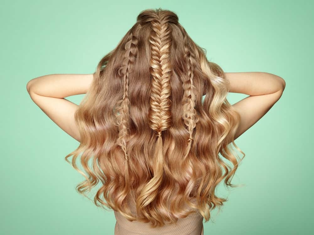Thick, sandy locks mean lots of hair to play with. Try a mermaid hairstyle with a multitude of thin, straight, plain and fishtail braids and style your lose hair into natural waves. Rock the look at a party, a bar or a red carpet event.