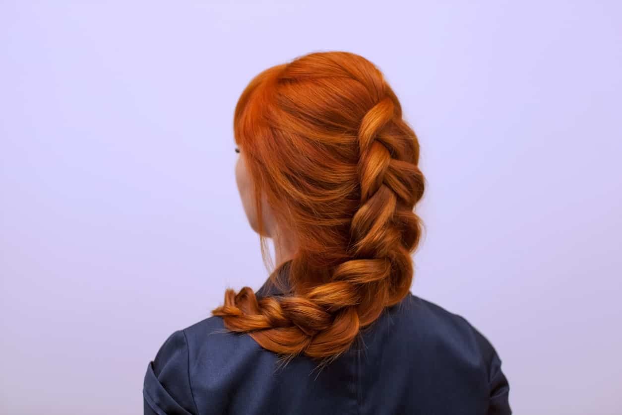 French braids look really pretty at any event. The auburn color also highlights the hairstyle even more since they won’t stand out so well with darker hair colors. 