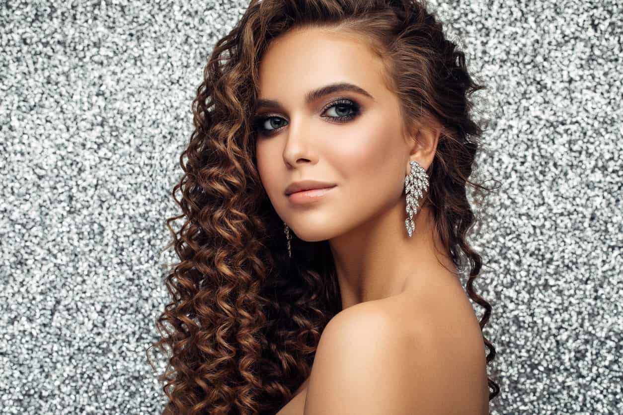 If your hair is long as well as thick, style it in some long corkscrew curls. The great thing about this hairstyle is that it does not just add dimension to your hair but it also gives your hair a springy and bouncy impression.