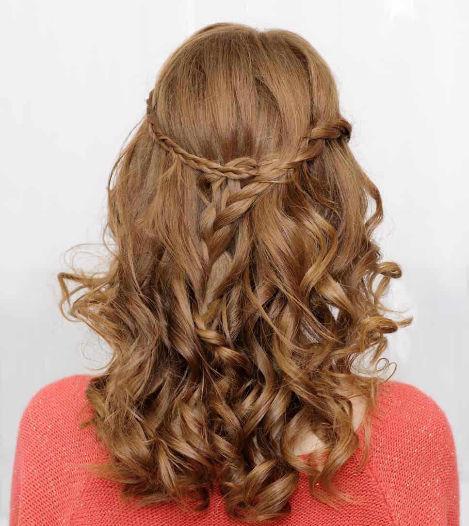 Waterfall hairstyle like this one can go well on various occasions. Bouncy curls give you a young, playful look.