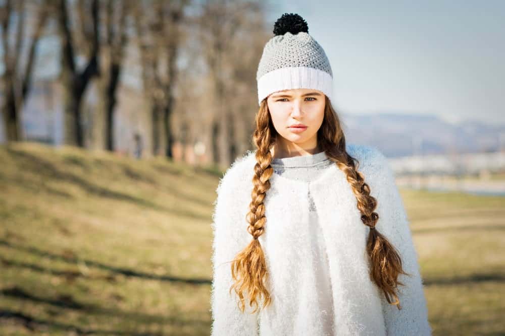 This super casual hairstyle can take ten, even twenty years off your face. Double braids are sure to score you numbers if you are into street style and hip hop.