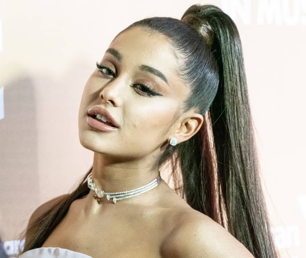 A ponytail as high as that of Ariana Grande might not be bearable for everyone but you can definitely take some ideas about why a long and sleek upward hairdo is sure to look impressive.