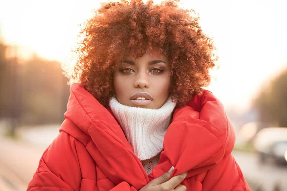 Ginger hair can also look great with tightly coiled curls. They give a really nice autumn feeling and develop great tones in natural sunlight. 
