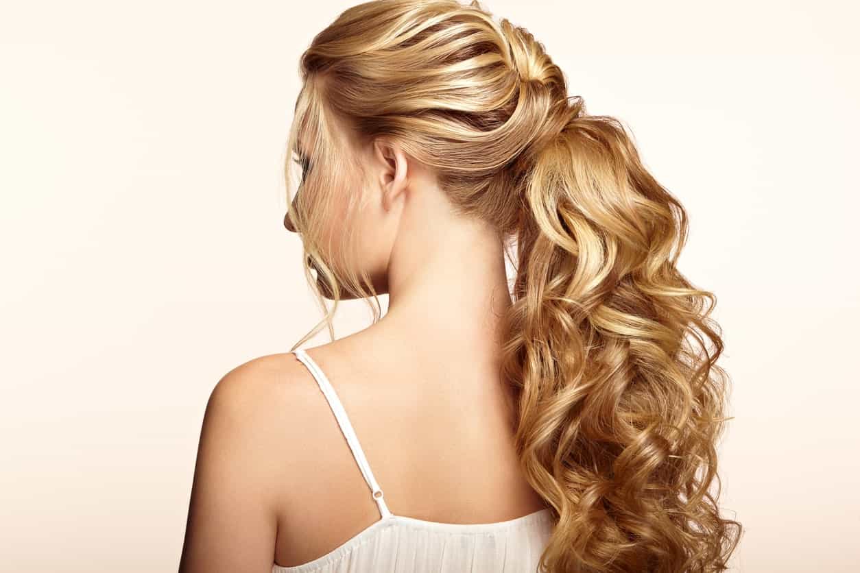 Big curls, slight layers, high ponytail-cum-lose-plait with lots of volume – this hairstyle for women with long hair is simply to die for. Brush out a few thin strands to gently frame the face, which will make you look oh-so-pretty!