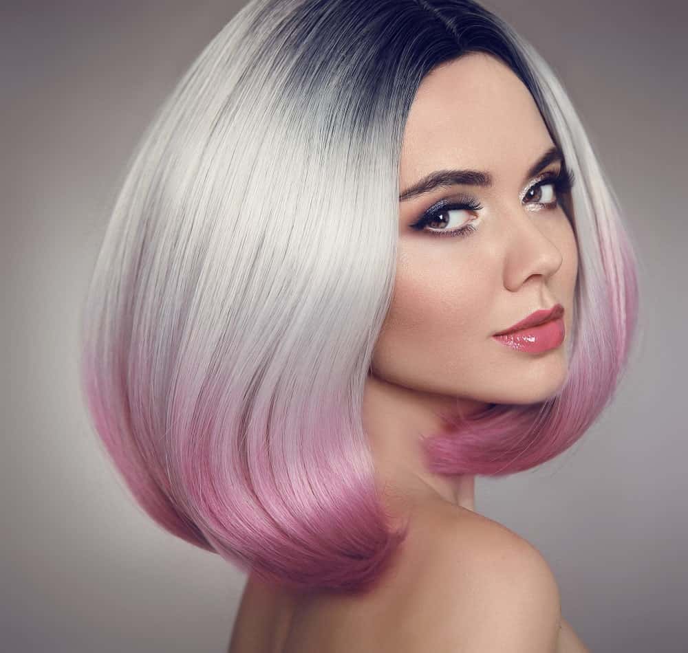 Jump onto the silver hair and colombre bandwagon. Give your hair a multi-toned metallic look by dyeing the top of your hair silver and transitioning it to metallic pink and purple colors. You can also choose other shades depending on your skin tone and color preferences.