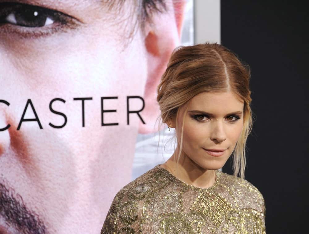 Kate Mara shows how you can make a chignon classy and messy. “The Martian” actress kept her roots dark but opted to add caramel brown to pale blonde colors in her ombre. She parted her hair in the middle to pull it back in a chignon and pulled several strands loose from her bun to frame her face. The result was an edgy yet chic look.