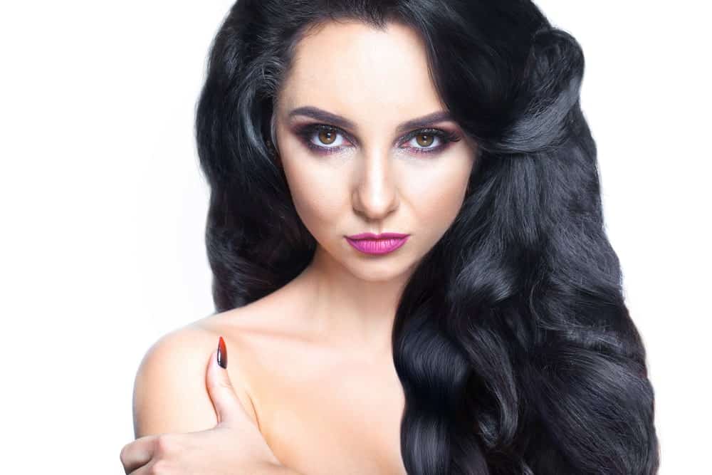 If you have thick hair, this is a great hairstyle for you, which has large blocks of curled hair all set together, giving it a very dramatic effect.