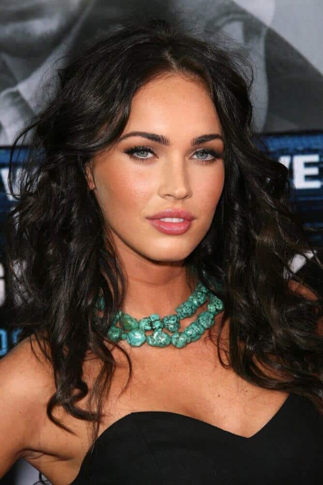 Megan Fox channeling her subtle edginess with this medium-length, wavy hairstyle tousled a little for an extra texture.