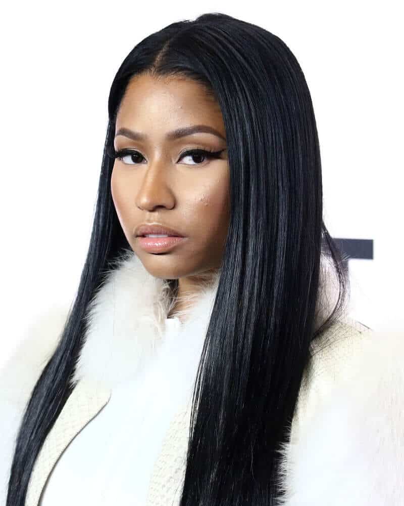 Nicki Minaj sporting a simple yet classy look with her long, straight hair with a sleek and polished finish.