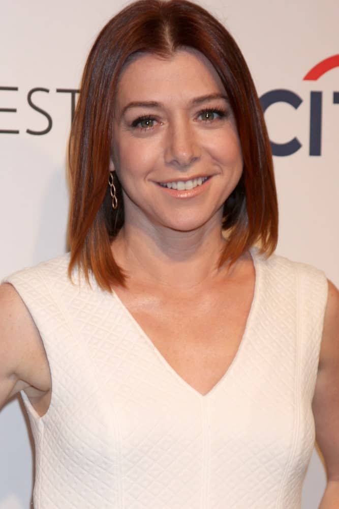 Alyson Hannigan perfectly demonstrates how wonderful having red hair can be because a hairstyle as simple as this can look really great. If you want short red hair that doesn't require much styling, then go for a chin-length cut and wear your hair down to look effortlessly stylish.