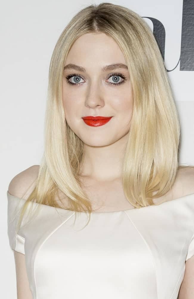 Pretty and simple, Dakota Fanning sports a basic and gorgeous hairstyle with same-length hair that has been parted in the middle. When time isn’t your best friend, and you are running late, this hairstyle will definitely come in handy!