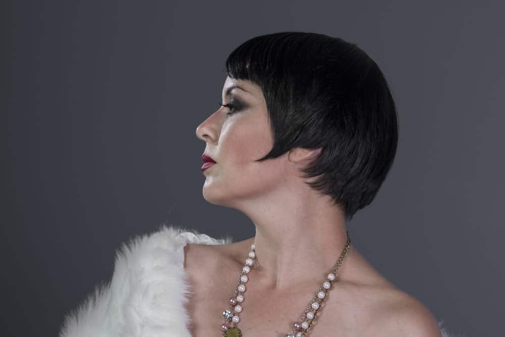Straight out of “The Great Gatsby,” this flapper-style cropped look is an easy, low-maintenance and effortless look for some elegance and glamour. This retro hairstyle looks good on women of all ages.