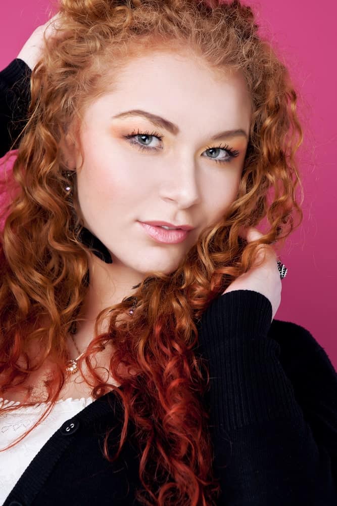 Curly hair that has been dyed a fun shade near the tips is another brilliant way to accentuate the coily texture.