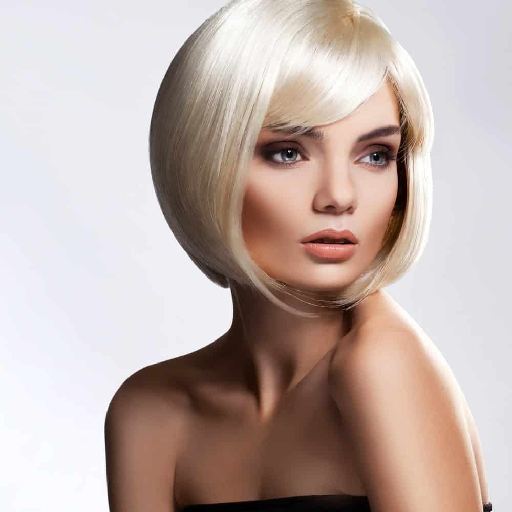 Not everyone can pull off short hair but if you think you can, you ought to get your hair styled this way. It is a sleek short bob with small bangs in the front, and the hair from the bottom has been turned inwards. If anything, this hairstyle will definitely get you some head turns!