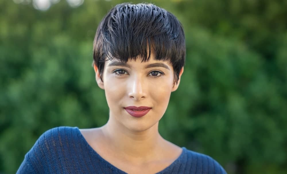 A cute mushroom pixie goes a long way to give your hair some character. Cut your hair short in the same length on all side and make it lie flat.  Give your eye-skimming bangs some uneven, jagged cut for a more volumizing look.