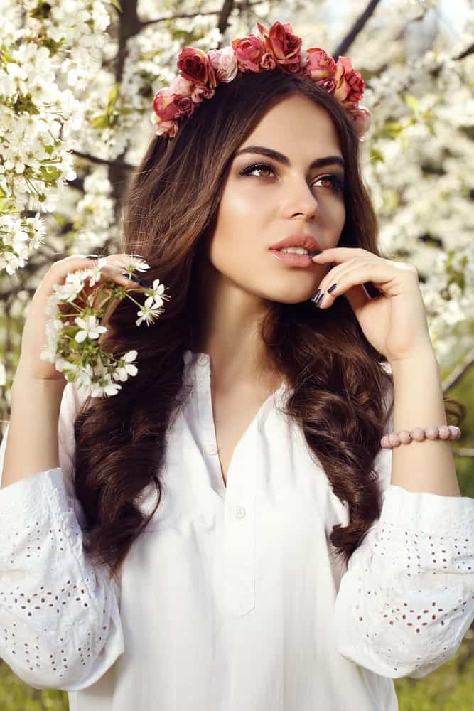 Because of the natural texture of wavy hair, it is the best hair type to use hair accessories with. Flower crowns especially have a very ethereal look and sit beautifully on top of a head of gorgeous waves. 