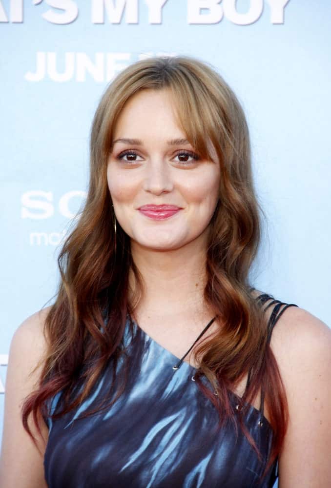 She might be famous for playing the snooty rich girl in Gossip Girl, but the fact is that everyone loves Leighton Meester nonetheless. Here we see the charming beauty sporting a really fascinating hairstyle for women with curly hair. While she merely wears the loose curls on both sides, what makes her look unique is the distances eyebrow-level bangs combined with a trendy hair color that starts out as pale blonde near the roots and gradually darken into mahogany brown at the tips.