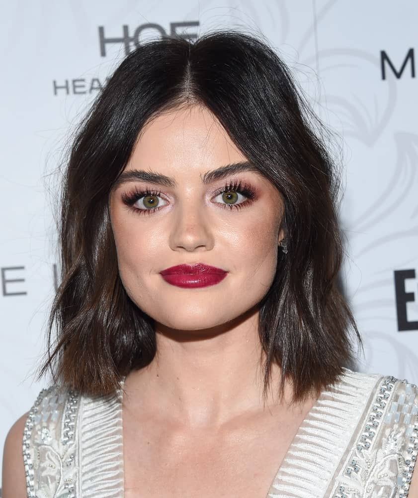 This layered bob haircut for women might not be something particularly new, but it is surely different from the traditional styles in the sense that it consists of Hazel brown lowlights at the tips. The stunning actress, Lucy Hale has chosen a blunt cut for a more hip and edgy style. 
