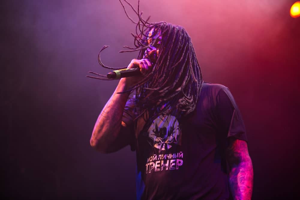 This is the famous hip-hop singer Wacka Flocka Flame, originally known as Juaquin James Malphurs, who has almost never been seen without his signature dreadlocks! Here, he has let loose his dreads that elegantly fall down on his shoulders.
