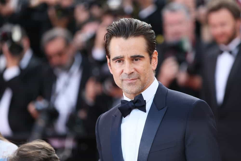 This great hairstyle worn by Colin Farrell is perfect for those men who want to keep their hair away from their face. Here, Farrell has kept the top of his hair about 4 to 6 inches long. However, his sides have been clipped shorter, but not too much. The shorter sides give his style balance and the top of his hair more volume. The slicked-back look gives Farrell a tidy appearance and is eye-catching and dramatic. It is a wonderful outgoing style.