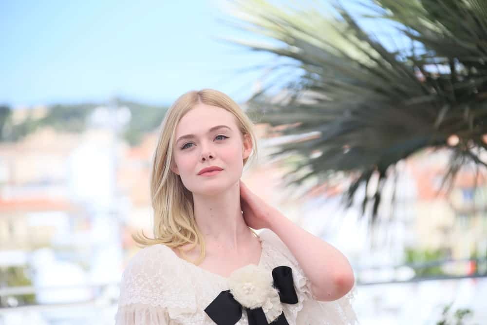 With her very pale complexion and hair, Elle Fanning looks like a fey creature. The “Beguiled” actress has very fine hair which she often wears in soft, minimal-fuss styles. Here, the actress has left her long locks loose but opted to give just a hint of curls to the ends for a more voluminous look. This style is perfect for women with superfine, straight hair, which does not easily hold elaborate styles.