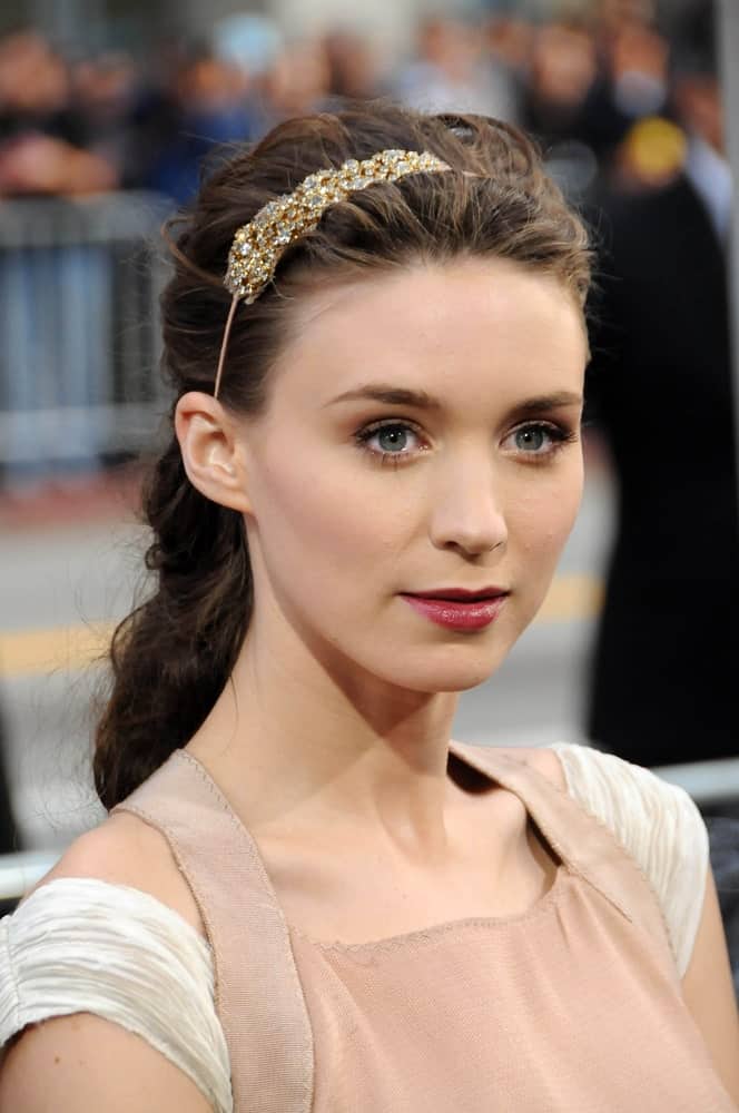 No matter what, half-up-half-down hairstyles will always be in fashion. Take notes from Rooney Mara’s impressive hairdo that is suitable for weddings as well. Backcombing her hair gives it more dimensions while a slim and sleek jewel headband exponentially boosts the stunning look. 