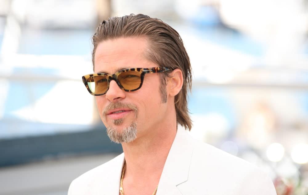 If you want to keep thing super-cool and modern, try this slicked-back style with long hair, like Brad Pitt. The actor added lots of gel product to give his hair a super-wet look. He then pushed it back and combed it down to his shoulders. The look is super casual and super cool and perfect for a day out chilling.