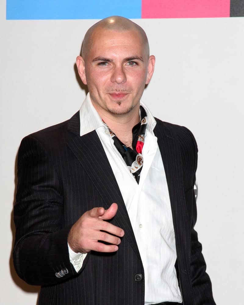 As if Pitbull didn’t impress us enough with his music, he went on to do that with this ultimately classic shaved head that is more like a hybrid version of the buzzed and close-shaved haircut. The subtle dimples on his cheeks and the soul patch just below the lower lip make him look super handsome and chic. He pulls off this shaved look impeccably that also makes him look super young and smart.
