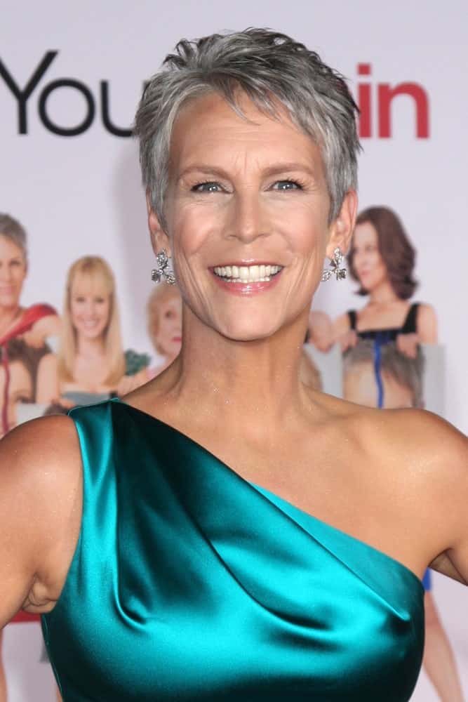 This elegant gray hairstyle for women over 50 is beauty and grace personified. The American actress, author, and activist, Jamie Lee Curtis sported this really short pixie cut with baby bird bangs at the ‘You Again’ World Premiere in Los Angeles, CA. 