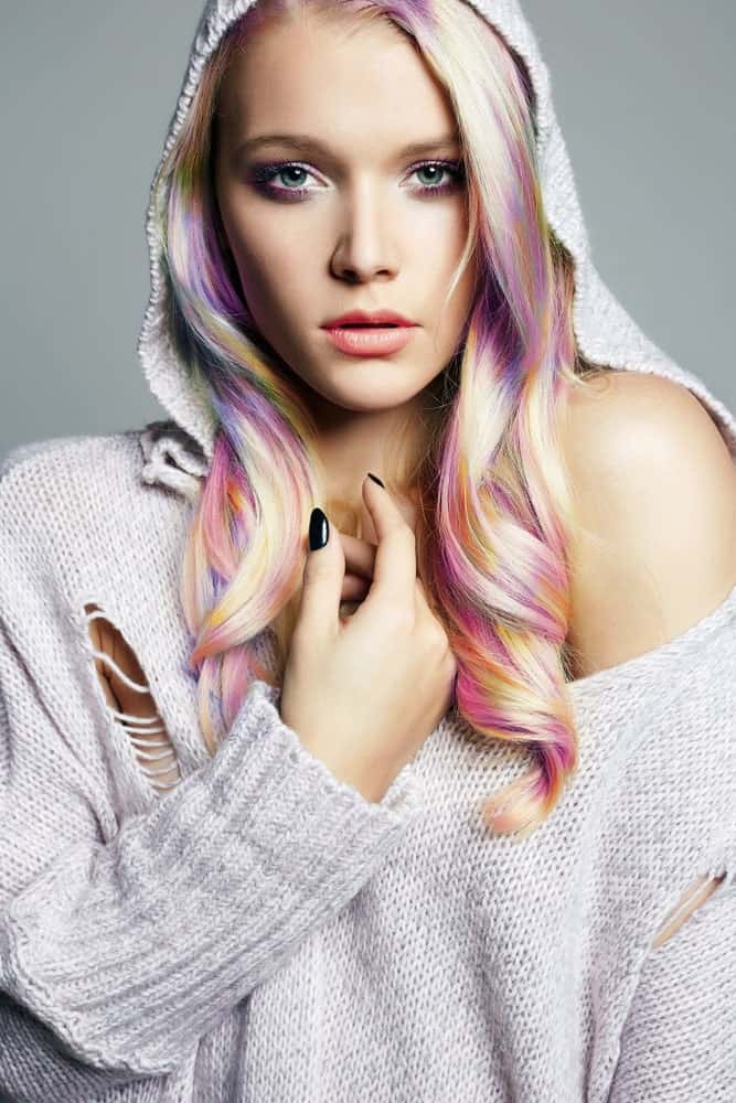 This is one of our favorite types of mermaid hairstyle. Unlike the classic ombre, where one hair color bleeds into the next in a seamless way, this technique takes sections of individual locks and dyes them in contrasting color. The result is this piece-y effect where every color of the rainbow stands out in pieces in every lock. This style is also very high-maintenance and will take hours and hours to get. It is worth the effort though.