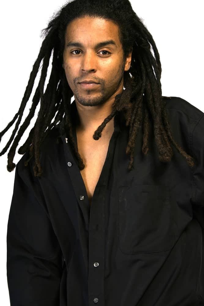 These are long dreadlocks that have been simply let loose in the front. It is a super casual dreads-hairstyle that is perfect for those who wish to have simple dreadlocks without having to manage them much. 