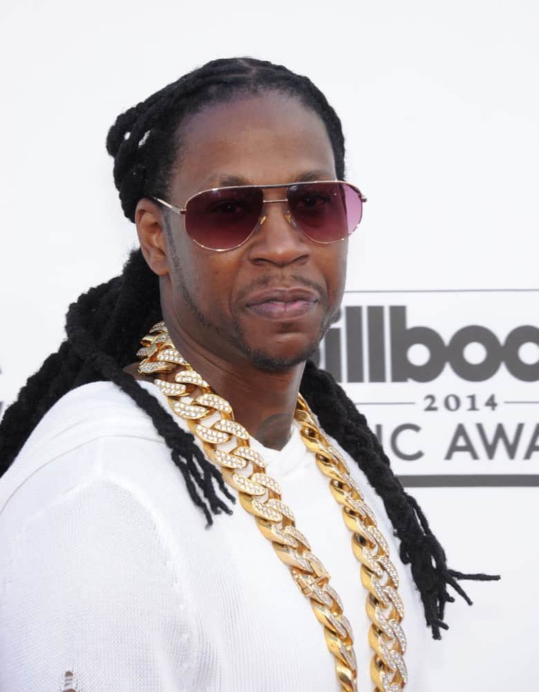 2 Chainz, the American rapper is not just famous for his rapping skills, but is also for his dreadlocks that are famous for being the ‘most stylish in the game!’ He has long dreadlocks that he has pulled back into a low ponytail. The ponytail has further been separated and then brought back to the front from both sides. 