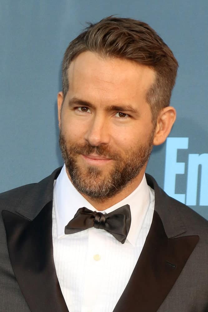 Take some inspiration from Ryan Rodney Reynolds if you are looking for a minimalistic, no-fuss hairstyle for men – one that doesn’t demand much time and attention but still makes you look smart and handsome. The side hair is shaved off just as in a buzzcut whereas the pinnacle is cropped to a length that provides enough volume but hardly requires you to even brush it even once – it’s just manageable on its own.